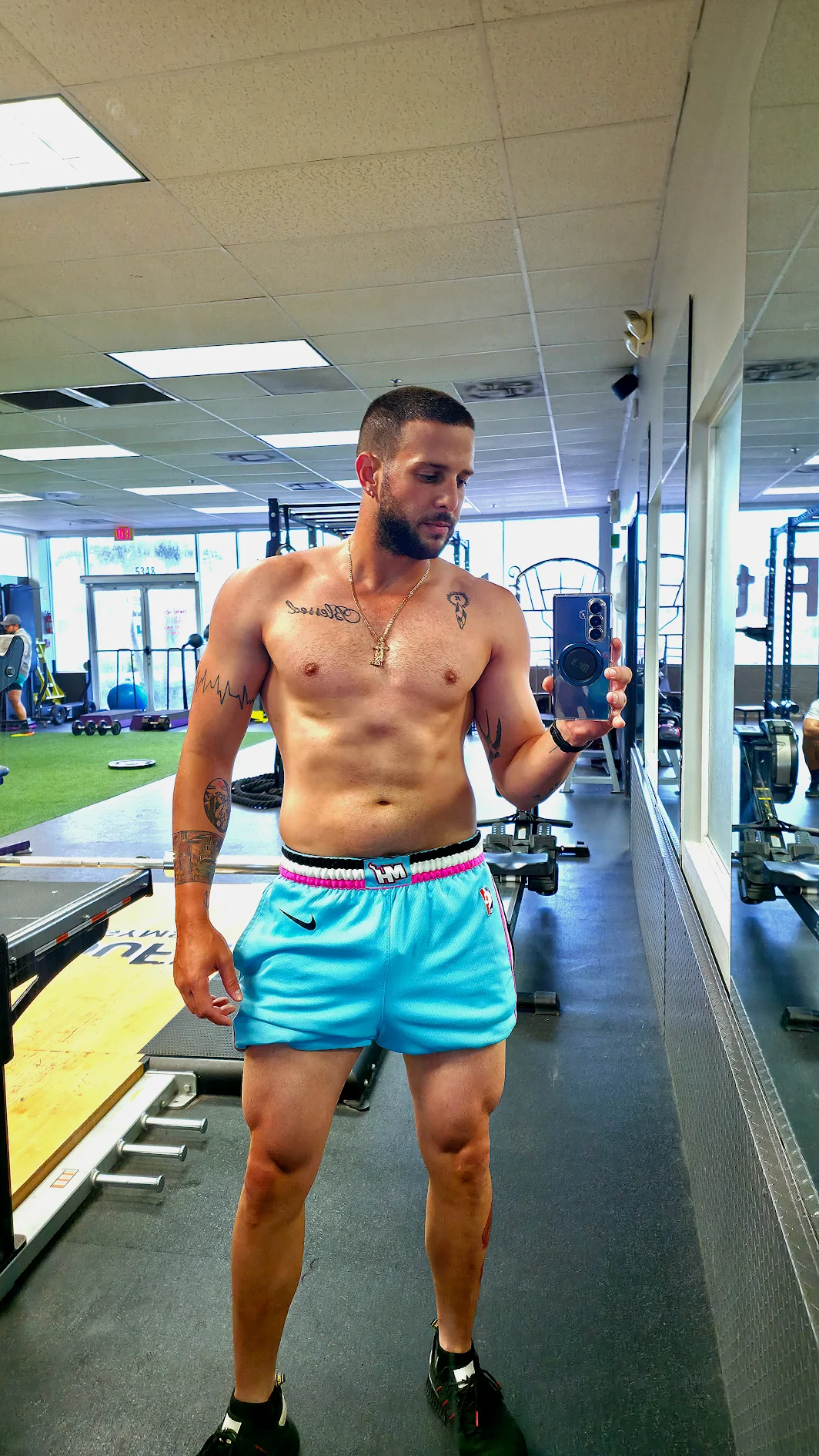 ulio's after transformation photo at day 30 showing significant muscle definition and fat loss after training with Coach Argota